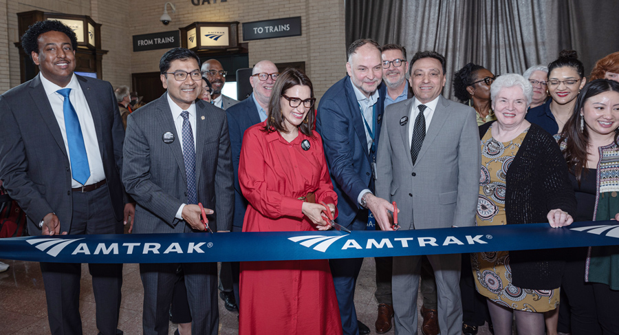 Amtrak and local and state officials cut a ribbon.